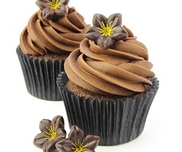 Dark chocolate flower decoration on cupcakes