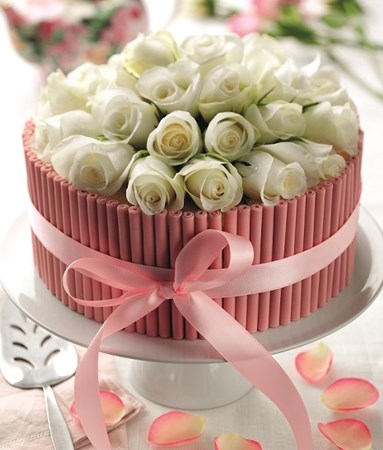 Pink chocolate cigarellos cake