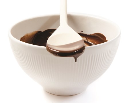 Chocolate bowl with wooden spoon