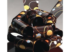 Metallic Orbit, chocolate transfer sheets example (on dark chocolate)