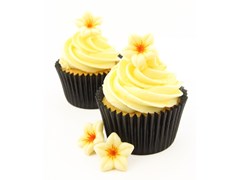 Chocolate flower decorations on cupcakes