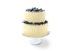 White chocolate pencils decorated cake